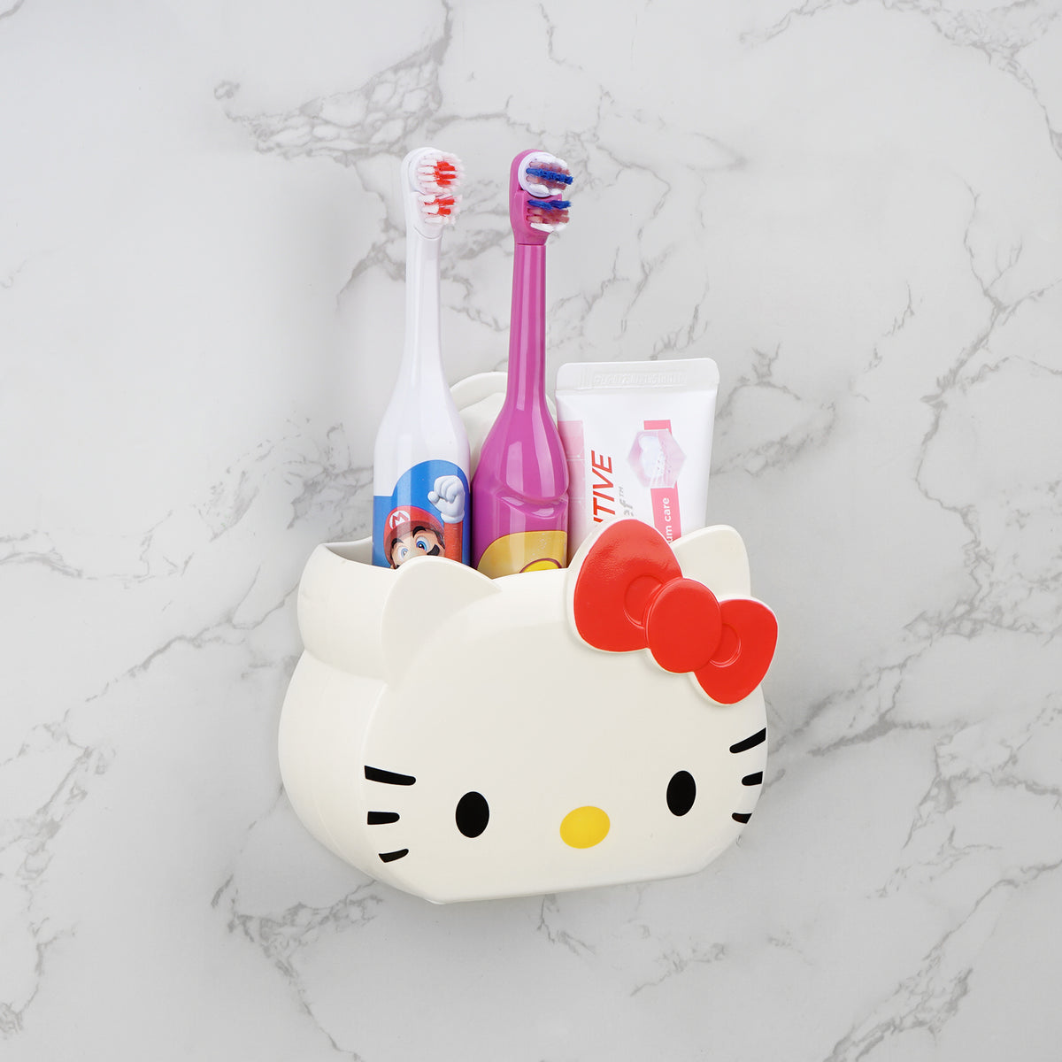 Adorila Wall Mounted Toothbrush Holder for Kids, Self Adhesive Toothbrush Storage Organizer, Hello Kitty Electric Toothbrush Toothpaste Holder for Bathroom (Pink)